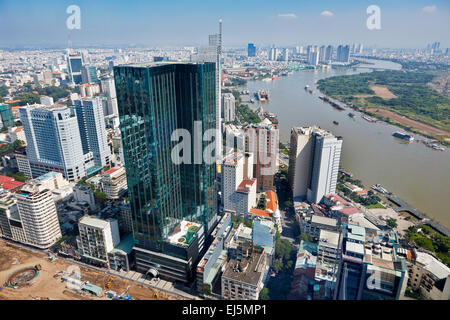 Aerial view of the city and Saigon River from Bitexco Financial Tower Observation Deck. District 1, Ho Chi Minh City, Vietnam. Stock Photo