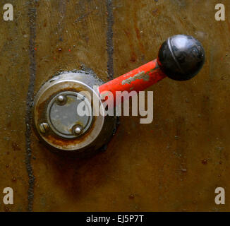 A Grungy Industrial Lever On Some Heavy Machinery Stock Photo