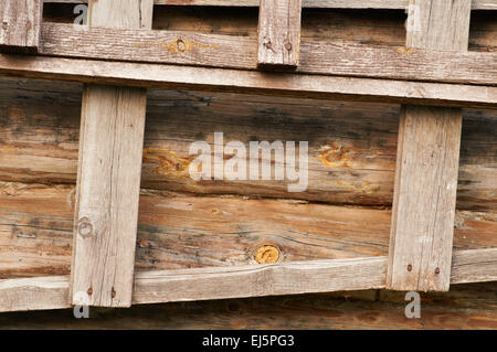 Wooden background - part of log cabin and ladder Stock Photo
