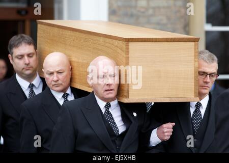 Leicester, UK. 22nd March, 2015. The departure of the mortal remains of King Richard III from the University of Leicester. Pallbearer's exit the university bearing the oak coffin containing the remains of the king. Credit:  Michael Buddle/Alamy Live News Stock Photo