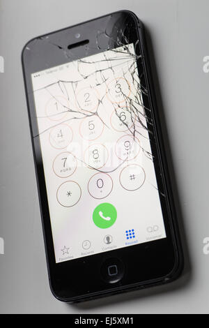 Broken Apple iPhone 5 screen. Stock Photo