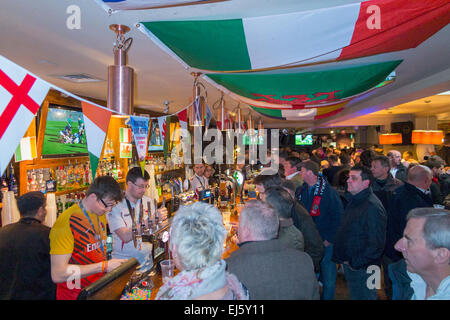Rugby fan crowd / fans at crowded busy bar - The George pub / public house. Twickenham UK; popular on match days. Stock Photo