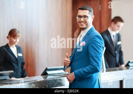 Hotel welcomes a guest today Stock Photo