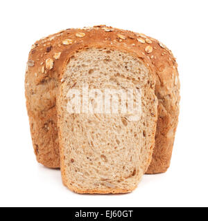 Cereals bread isolated on white. One slice is in front of loaf Stock Photo