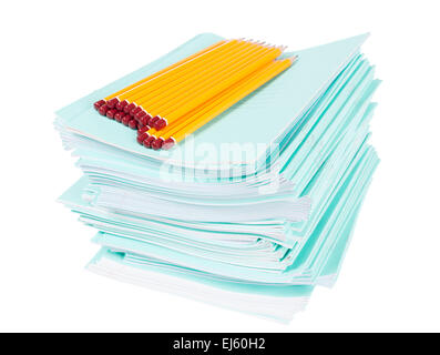 Notebooks and pencils over on the white background Stock Photo