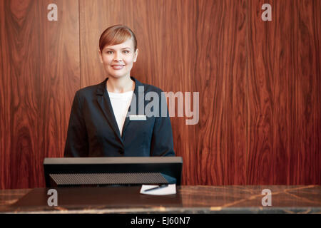 Charming receptionist at work Stock Photo