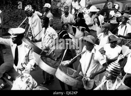 AJAXNETPHOTO .1956. ST.GEORGES, GRENADA, WEST INDIES. - STEEL BAND CARNIVAL PARADE THROUGH ST.GEORGES. PHOTO; REG CALVERT/AJAX   ©AJAX NEWS & FEATURE SERVICE/REG CALVERT COLLECTION   REF:1957 BW006 Stock Photo