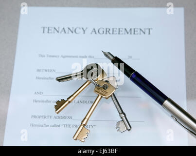 Tenancy agreement document and house keys, London Stock Photo