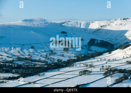 Grindslow Knoll, Grindsbrook Clough and the Kinder Scout plateau in winter, over Edale, Peak District, Derbyshire, England, UK. Stock Photo