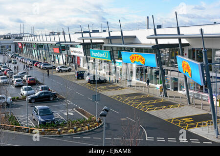 Aerial view part of Junction Retail Park shopping centre free car park & selection of retail businesses Dartford Bridge beyond West Thurrock Essex UK Stock Photo