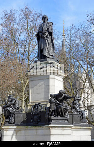 Statue of William Ewart Gladstone outside the RAF Chapel St. Clement Danes The Strand City of London England UK Stock Photo