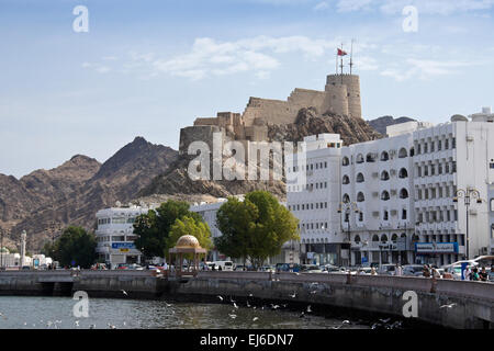 Mutrah Fort on hill above the corniche, Mutrah, Muscat, Sultanate of Oman Stock Photo