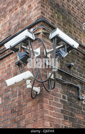 CCTV security cameras mounted on a wall of a building, London England United Kingdom UK Stock Photo