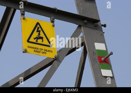 Danger Of Death Keep Off Sign bolted power pylon Stock Photo