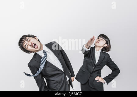 Japanese business people fighting extremely Stock Photo