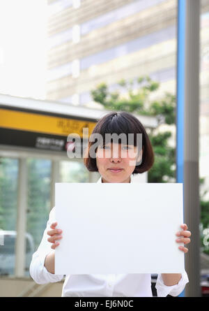 Japanese business woman with white board Stock Photo