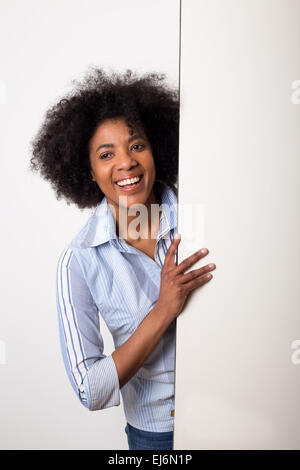 young woman holding a blank board with copy-space Stock Photo