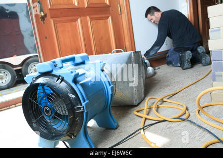 Ventilation cleaner working on a air system. Stock Photo