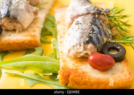 Roasted toasted sandwich with big Atlantic sardines in oil Stock Photo
