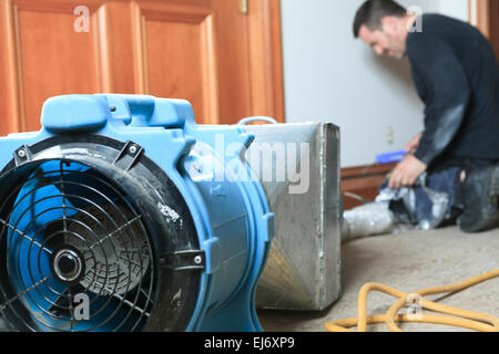 Ventilation cleaner working on a air system. Stock Photo