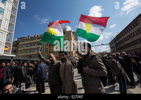 Kurdish, Turkey. 22nd Mar, 2015. Three men dressed in military fatigues similar to those of “Peshmergas”, the Kurdish fighters, wave Kurdish flags, at Newroz celebration rally. © Piero Castellano/Pacific Press/Alamy Live News Stock Photo