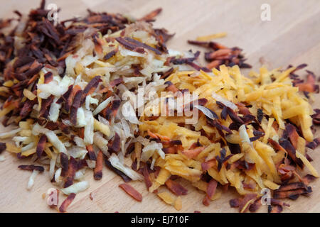 Daucus carota - coloured cultivars of carrot ssshredded for use in carrot cake Stock Photo