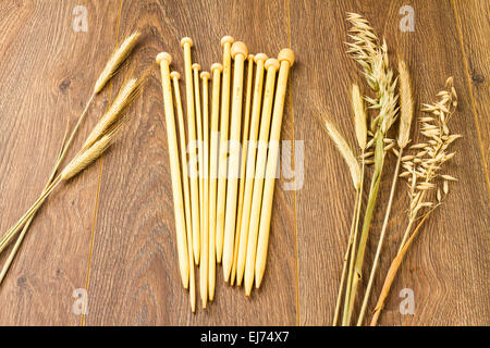 wooden knitting needles on background of grey merino wool blanket Stock  Photo - Alamy