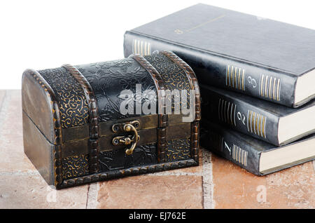 Chest and pile of books Stock Photo
