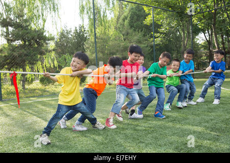 The boys are tug of war Stock Photo
