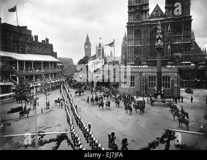 Coronation of King George VI. Aerial view of the procession in progress marching down Victoria Street toward Westminster Abbey.  12th May 1937. Stock Photo