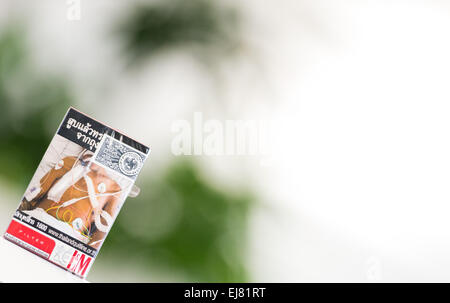 A deterring image of a patient connected to medical mashines features  on a package of cigarettes of the brand L&M from Thailand in Berlin, Germany,  6 March 2015. Photo:  Lukas Schulze/dpa Stock Photo