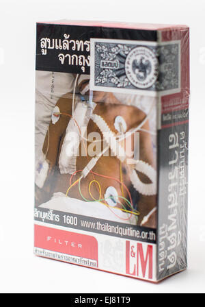 A deterring image of a patient connected to medical mashines features  on a package of cigarettes of the brand L&M from Thailand in Berlin, Germany,  6 March 2015. Photo:  Lukas Schulze/dpa Stock Photo