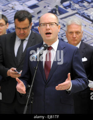 Kvasiny, East Bohemia. 23rd Mar, 2015. Czech Prime Minister Bohuslav Sobotka speaks during his visit in Kvasiny, East Bohemia, Czech Republic, March 23, 2015. Behind him stand Minister of Industry and Trade of Czech Republic Jan Mladek (left) and Skoda Auto CEO Winfried Vahland. Bohuslav Sobotka and representatives of the Hradec Kralove Region and Skoda Auto signed a cooperation memorandum on the development of the Solnice-Kvasiny industrial zone according to which the zone will get about Kc2bn from public resources. © Josef Vostarek/CTK Photo/Alamy Live News Stock Photo