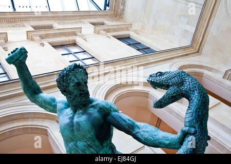 man fight snake sculpture Louvre museum Stock Photo - Alamy