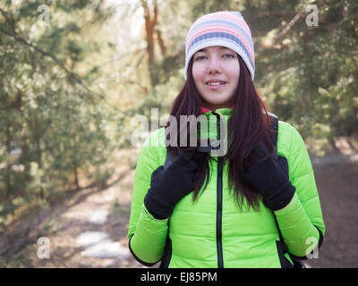 Close up portrait of a older woman hiking in the forest Stock Photo