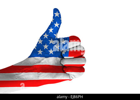 Hand with thumb up gesture in colored American national flag isolated on white background. Stock Photo