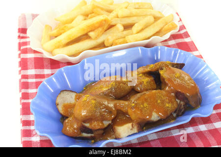 Currywurst with french fries Stock Photo