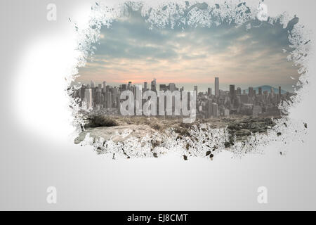 Splash on wall revealing cityscape Stock Photo