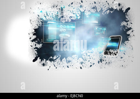 Splash on wall revealing technology interface Stock Photo