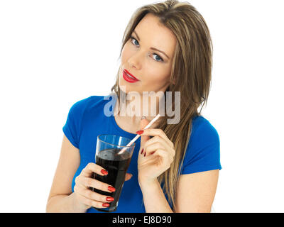 Attractive Young Woman Drinking Fizzy Cola Drink Stock Photo