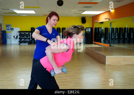 The Netherlands. Naaldwijk. 21-01-2015. Fitness with a personal trainer. Stock Photo
