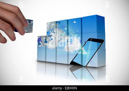 Composite image of hand building wall Stock Photo