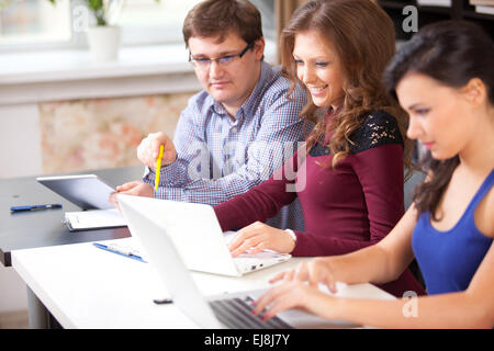 Group of students  in computer lab Stock Photo