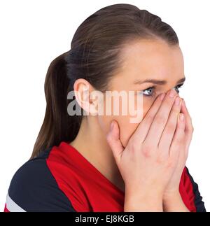 Nervous football fan in red Stock Photo