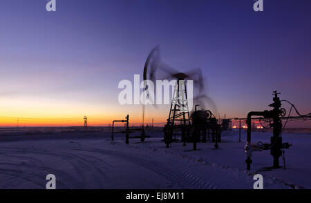 Oil rig in action. Stock Photo