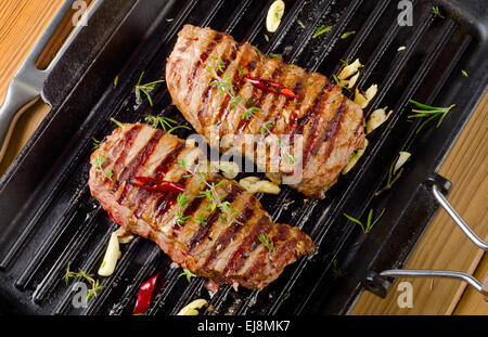 steak on a  grill pan . Selective focus Stock Photo