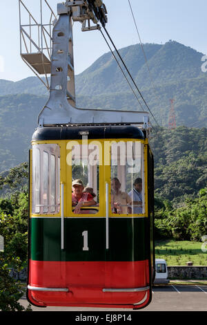 Tourists in Teleforico cable car approaching bottom station from Pico Isabel de Torres mountain Puerto Plata Dominican Republic Stock Photo