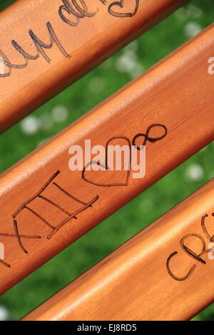 Scribble on a wooden bench Stock Photo