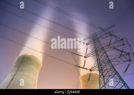 cooling towers and power transmission tower Stock Photo