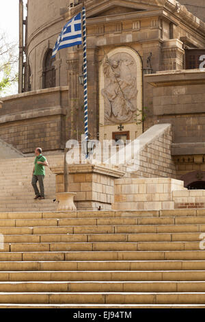 Tourist on steps in Coptic Cairo Stock Photo